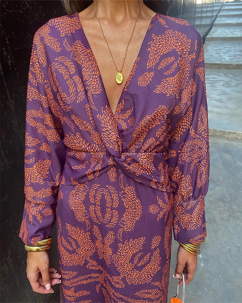 Grace – Robe midi élégante avec imprimé floral et nœud